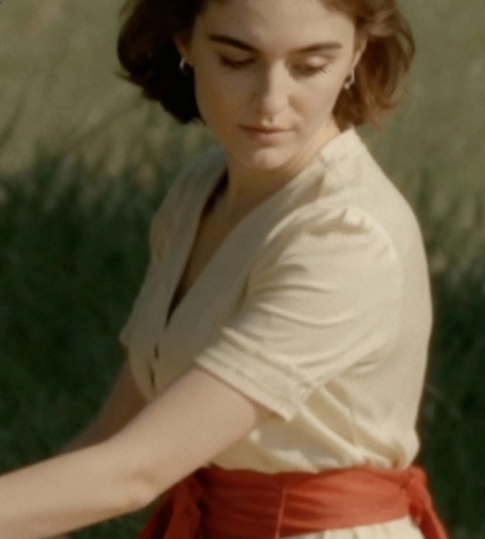 The mother image: a woman in a field at sunset with cinematic texture